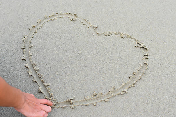 istock heart  in the sand. 537437108