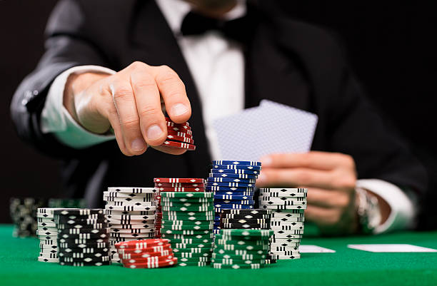istock poker player with cards and chips at casino 537437301