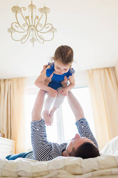 istock Father having fun with his cute little daughter 537438838