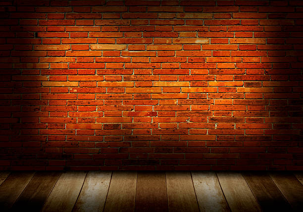 istock wood floor and brick wall background 537439081
