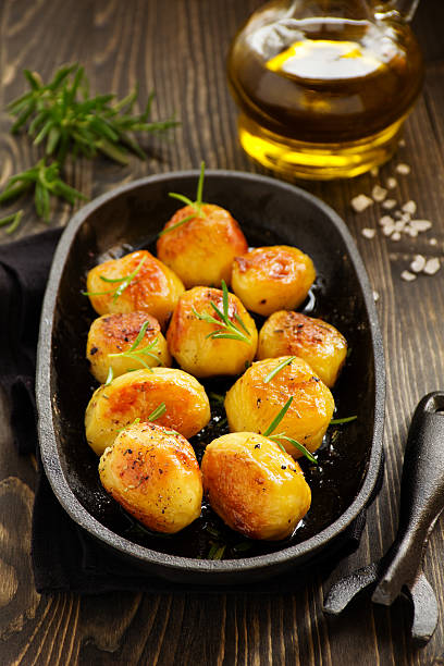 istock Baked potatoes with rosemary. 537439265