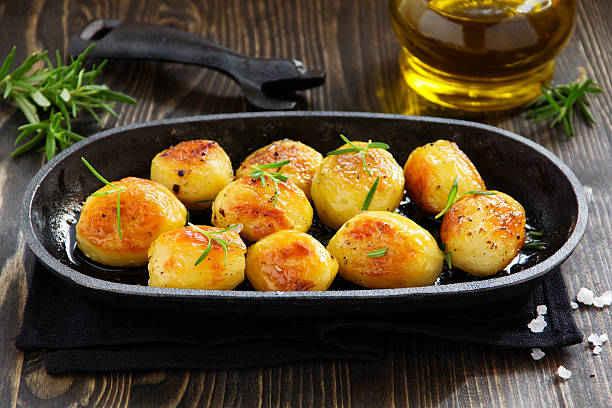 istock Baked potatoes with rosemary. 537439271