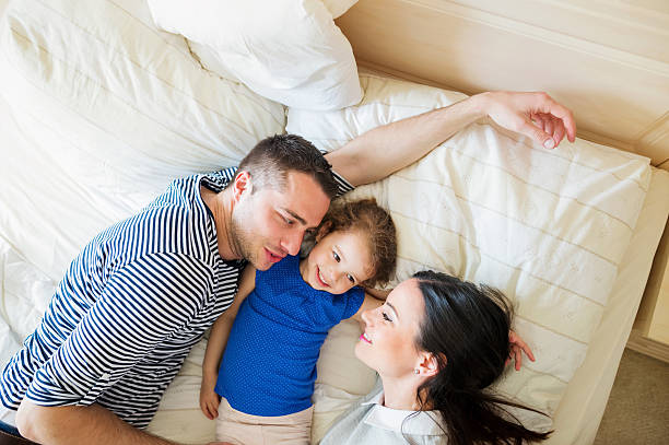 istock Parents having fun with their cute little daughter 537439600