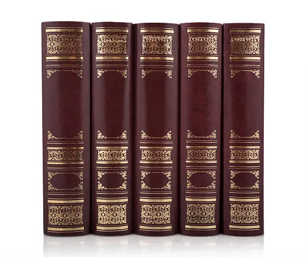 Old books set with leather spine and gold print.