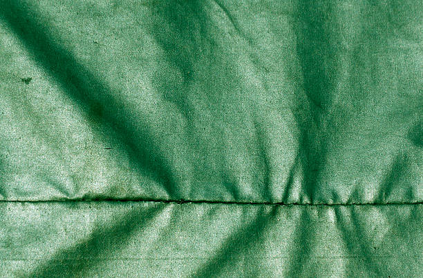 astratto verde in tessuto impermeabile. - sailcloth foto e immagini stock