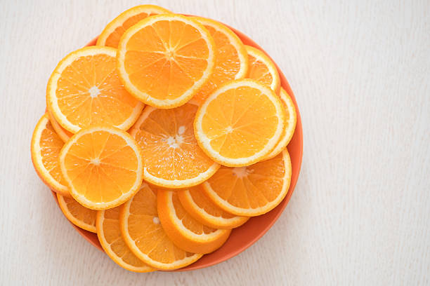 istock Ripe juicy oranges on a plate 537440776