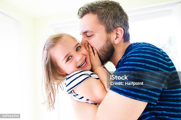 Close Up Of Hipster Father Kissing His Little Daughter Stock Photo - Download Image Now