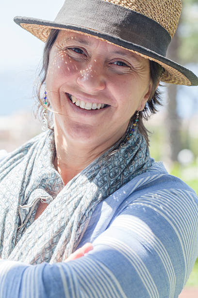 istock Beautiful Woman With Hat under Sun 537442568