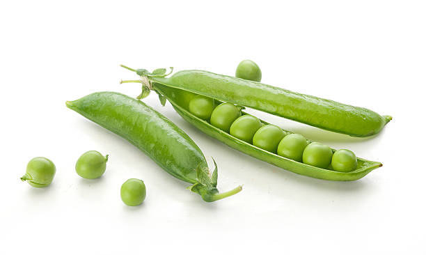 istock Fresh green pea pods and peas 537443450