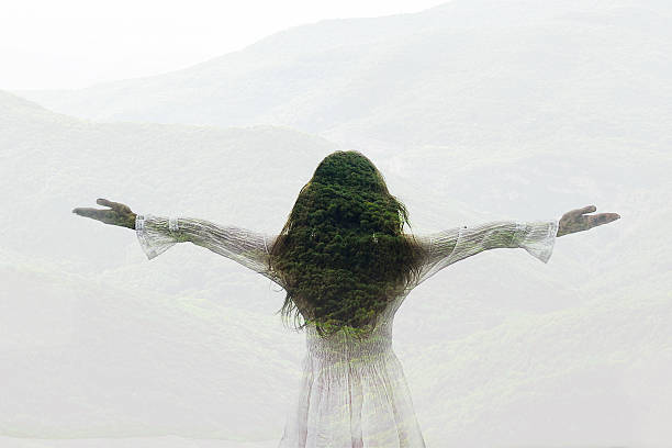 Double exposure  of beautiful caucasian woman and green hills 