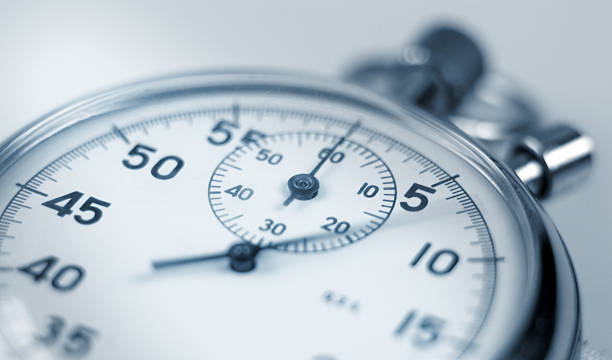 Stopwatch. Analog stopwatch close-up with blurred second hand. timer photos stock pictures, royalty-free photos & images