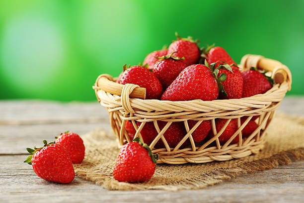 istock Fresh and tasty strawberries in basket 537449302