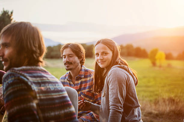 portrait of smiling girl at campsite - leisure activity three photos et images de collection