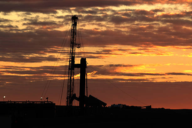 istock Sunrise oil drill rig flare flames Colorado grasslands copyspace 537452351