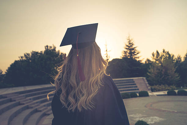 istock Beautiful Female College Graduate 537454000