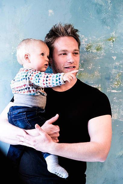 istock young father and baby son 537454192