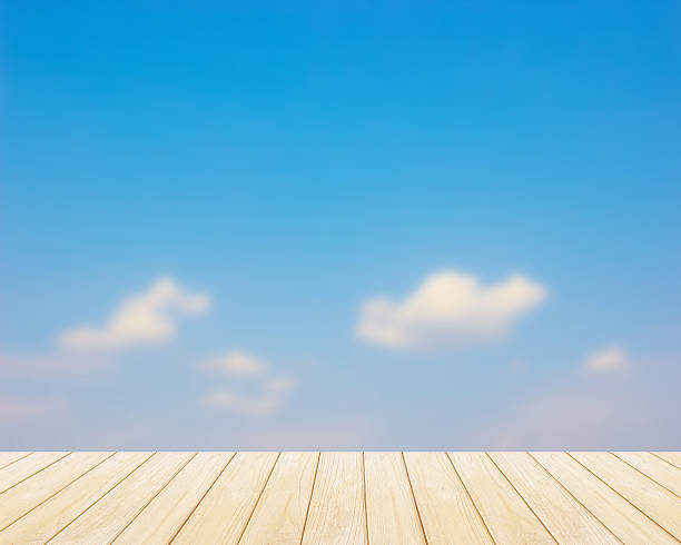 istock blur, blue sky Backgrounds and Wood Floor 537454923