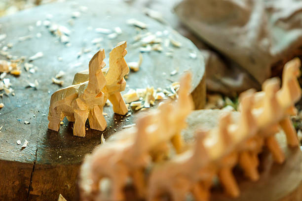 istock Hand of carver carving wood 537454977