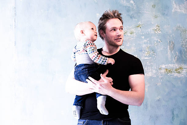istock young father and baby son 537455152