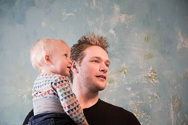 istock young father and baby son 537455402