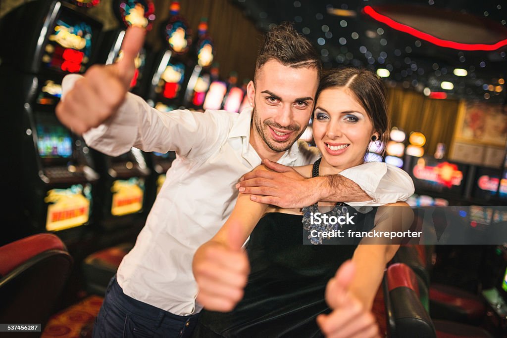 Happiness couple winning at Casino 20-29 Years Stock Photo