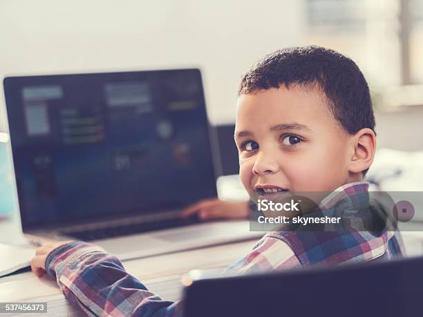 African American Boy Using Computer Stock Photo - Download Image Now - 2015, African Ethnicity, African-American Ethnicity