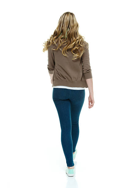 istock Rear view of female walking 537456469