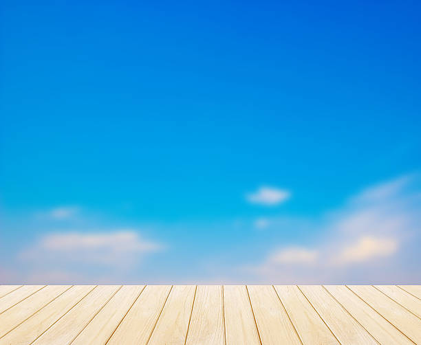 istock blur, blue sky Backgrounds and Wood Floor 537457147