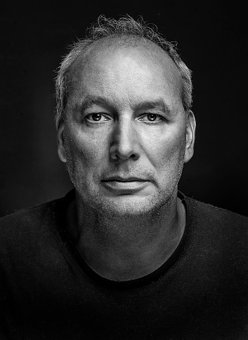 Black and white ortrait of a man, 49 years old.
