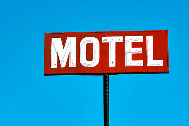 istock Typical American motel sign against a clear blue sky 537462392