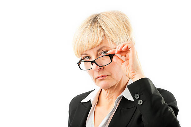 istock Mature woman looking through her glasses 537465450
