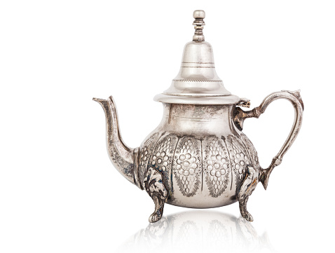 Metal teapot with beautiful ornaments.
