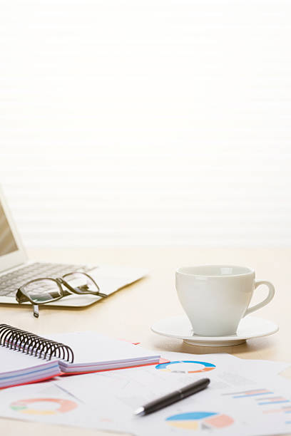 istock Office workplace with coffee, laptop and supplies 537465866