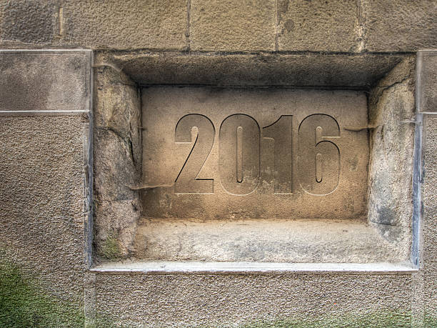 istock Plaque in old wall. Old/new year 2016. 537466974