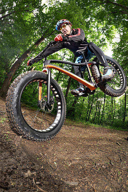 istock Bicycle rider in the woods 537467064