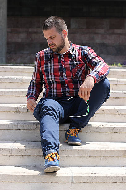istock Young man sitting on the sun 537467472