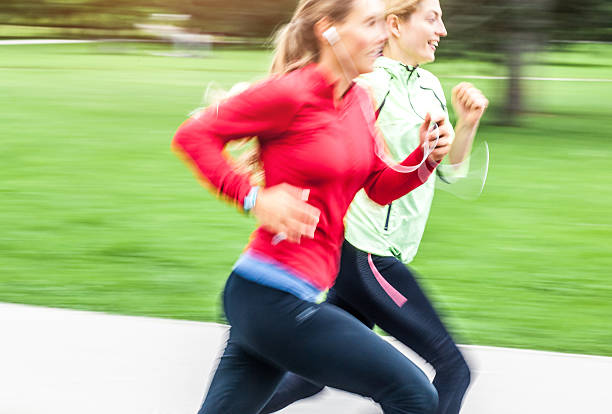 istock Young woman running 537468172
