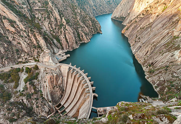 Aldeadavila Dam Aldeadavila Dam is a concrete arch-gravity dam on the Douro River on the border between Spain and Portugal. dam photos stock pictures, royalty-free photos & images