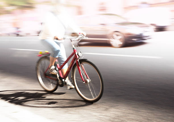 istock Woman on red bike 537470645
