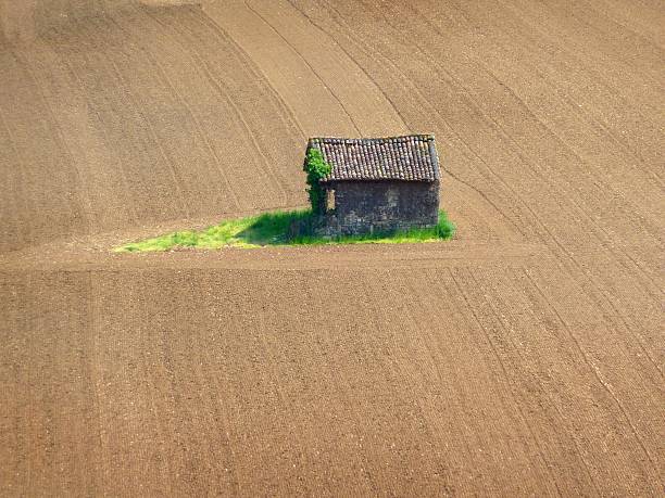 Weimar, Germany - May 3, 2023:  A beautiful countryside villa in Weimar, Germany surrounded by lush greenery and a clear blue sky. Perfect depiction of serene European living.
