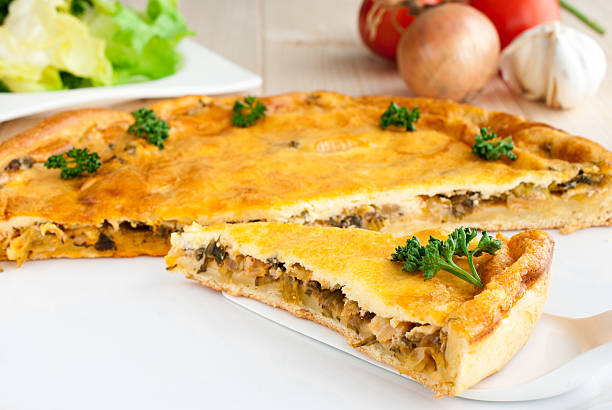 istock Piece of tart with salad 537470955