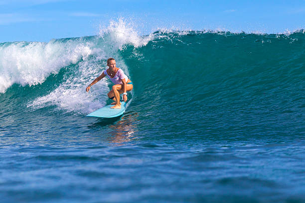 istock Surfer girl on Amazing Blue Wave 537471467