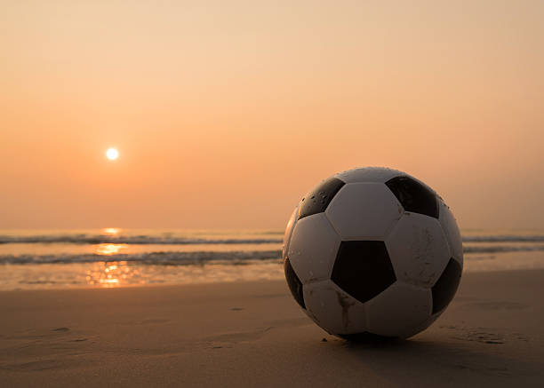 istock Football on the beach 537472630