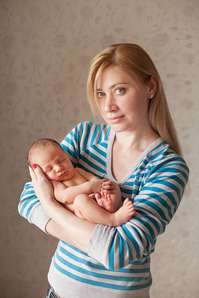 istock Newborn baby in his mother hands 537473334