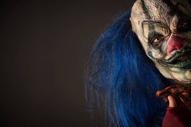 Creepy Clown With Blue hair stock photo