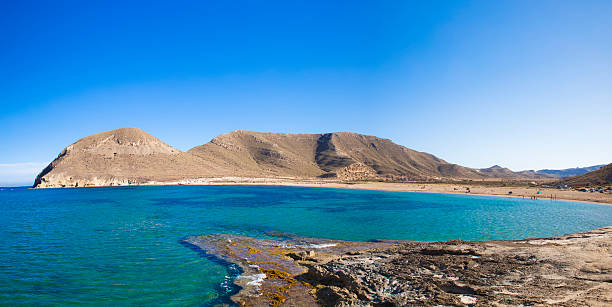 istock Beautiful view on bright blue bay against of mountain 537474246
