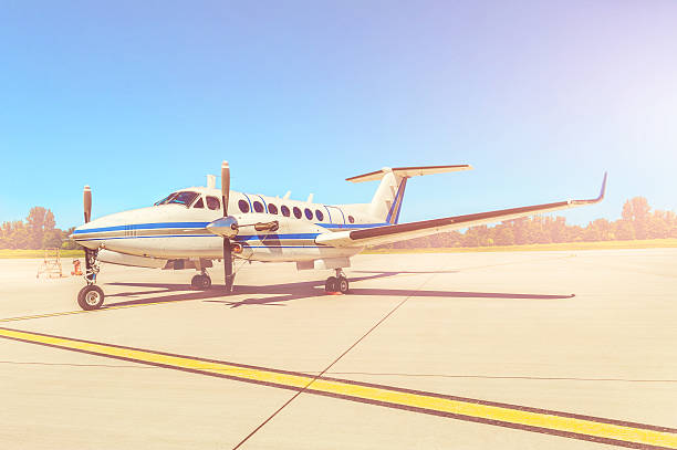 istock Propeller plane parking at the airport. Sunny day 537476910
