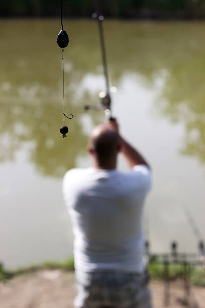 KD Rig, Blurred fisherman casting, 