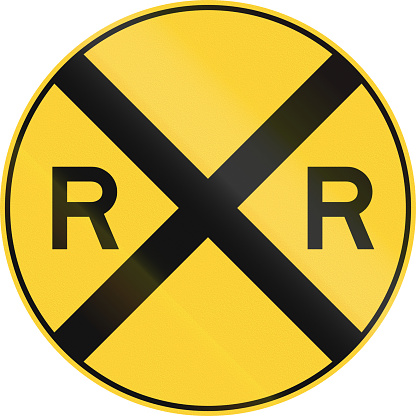 US road warning sign: Railroad ahead.