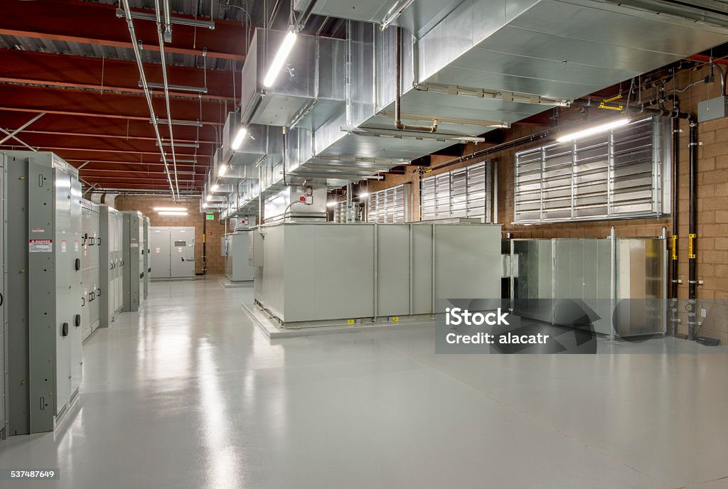 Ventilation Ducts and Power Supply for HVAC Ceiling mounted HVAC ducting with associated filters and power supply. 2015 Stock Photo